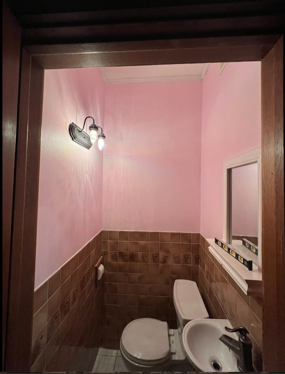 Bathroom after — clean walls, refreshed paint