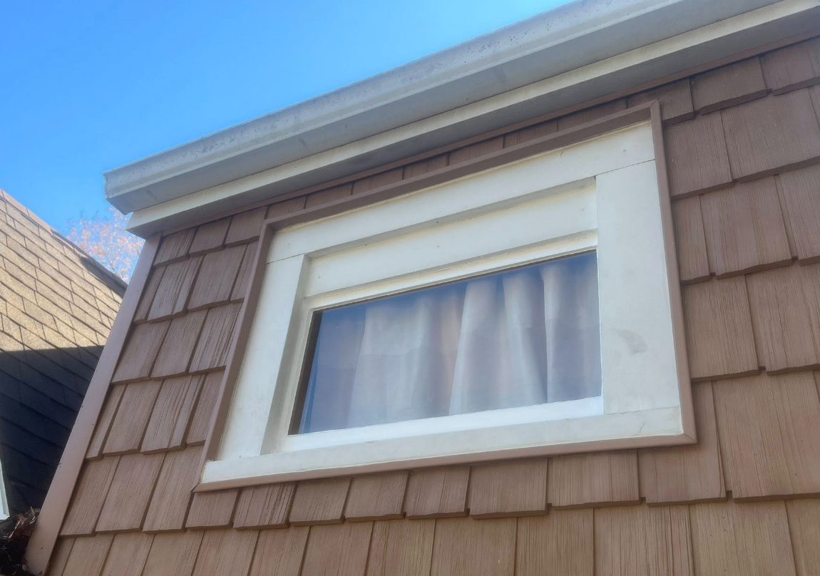 Second window with new wood casing